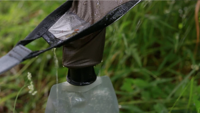 Kammok tarp collects rainwater for drinking